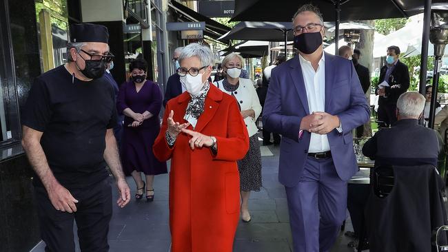 Linda Dessau arrives at Florentino Italian Restaurant in Bourke St with owner Guy Grossi, as she visits CBD businesses to see how they coped through lockdown. Picture: Ian Currie.