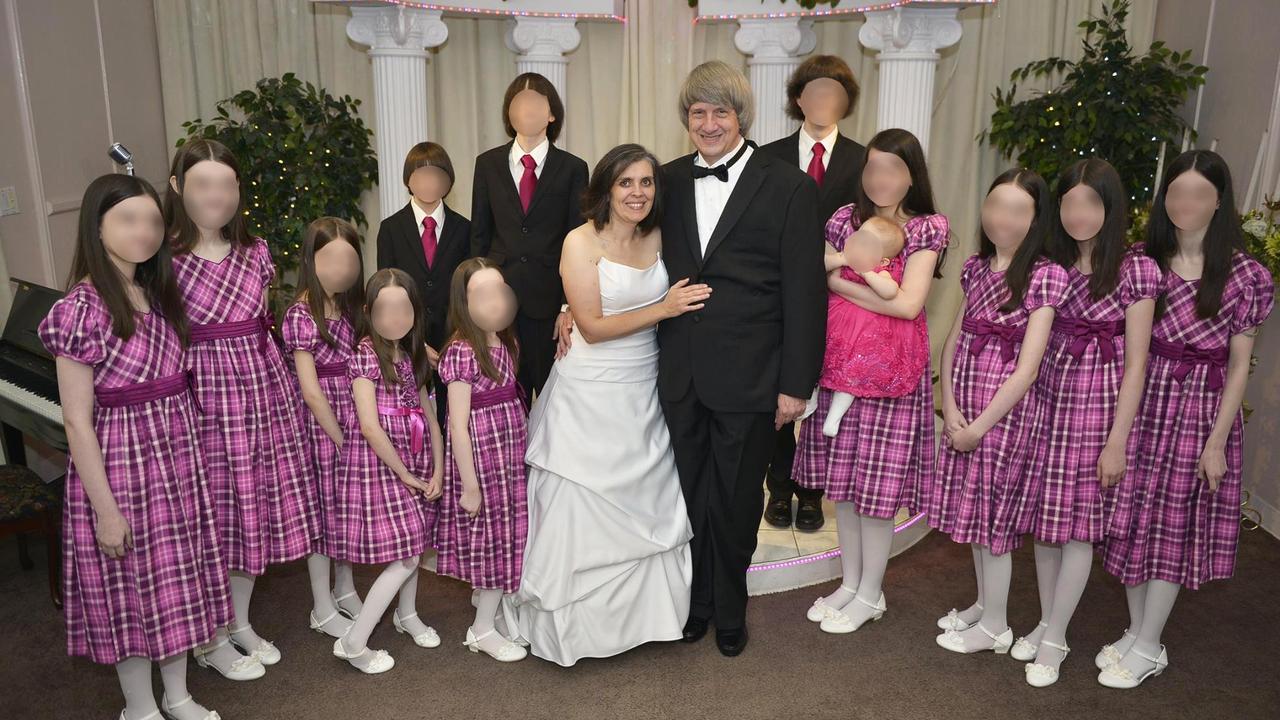The children with their parents on a rare outing when their parents renewed their vows. Picture: Supplied
