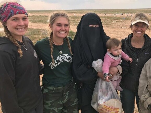 ISIS bride Zehra Duman with a group of people in a Syrian refugee campAustralian woman Zehra Duman (centre) with aid workers from the Free Burma Rangers in Syria.Supplied image