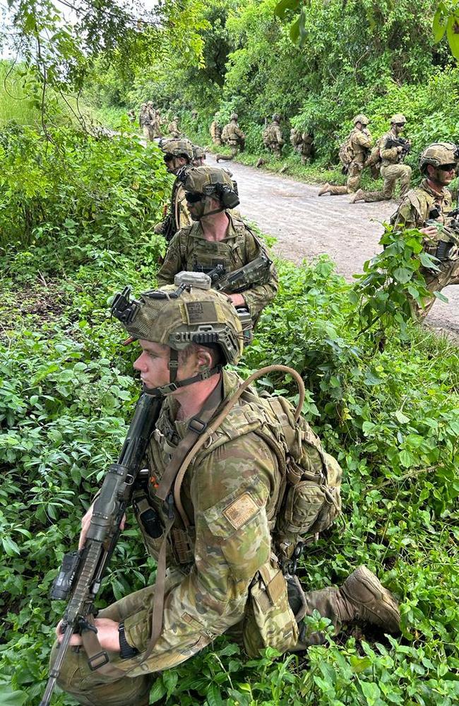 The combined armies storm a beach off Zambales in northern Philippines, the assault launched from HMAS Canberra positioned 3 nautical miles offshore. Picture: Charles Miranda