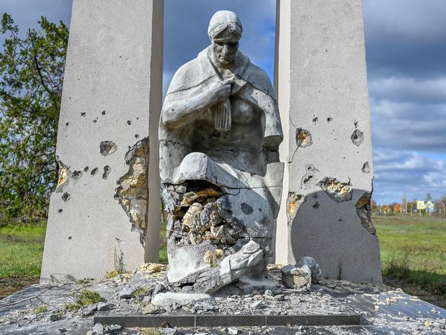 A damaged statue is pictured in the Kherson border region village, outside of Mykolaiv. Picture: AFP