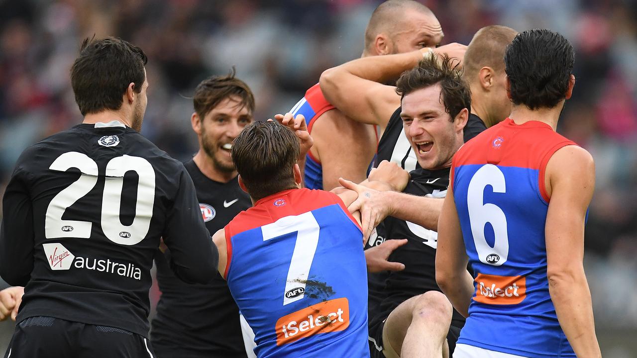 Jed Lamb gets in the face of Melbourne players. Photo: AAP Image/Julian Smith