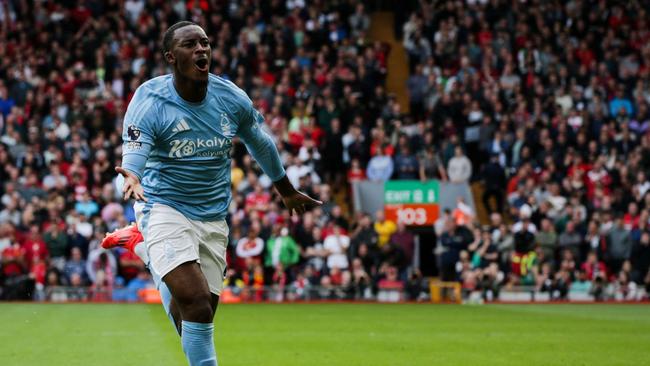 TOPSHOT - Nottingham Forest's English midfielder #14 Callum Hudson-Odoi celebrates after scoring his team first goal during the English Premier League football match between Liverpool and Nottingham Forest at Anfield in Liverpool, north west England on September 14, 2024. (Photo by Ian Hodgson / AFP) / RESTRICTED TO EDITORIAL USE. No use with unauthorized audio, video, data, fixture lists, club/league logos or 'live' services. Online in-match use limited to 120 images. An additional 40 images may be used in extra time. No video emulation. Social media in-match use limited to 120 images. An additional 40 images may be used in extra time. No use in betting publications, games or single club/league/player publications. /