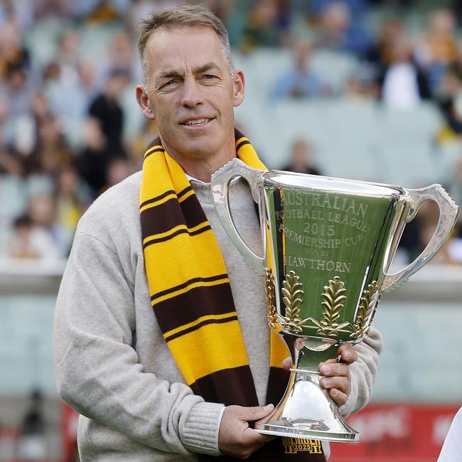 Caroline Wilson and Kane Cornes did not like North Melbourne coach Alastair Clarkson’s choice of scarf at Hawthorn’s centenary celebration on Sunday, putting them at odds with Hawks fans. Picture: Michael Klein