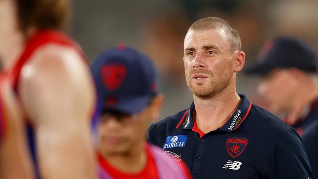 MELBOURNE, AUSTRALIA - MARCH 03: Simon Goodwin, Senior Coach of the Demons addresses his players during the 2022 AFL Community Series match between the Carlton Blues and the Melbourne Demons at Marvel Stadium on March 3, 2022 In Melbourne, Australia. (Photo by Michael Willson/AFL Photos via Getty Images)