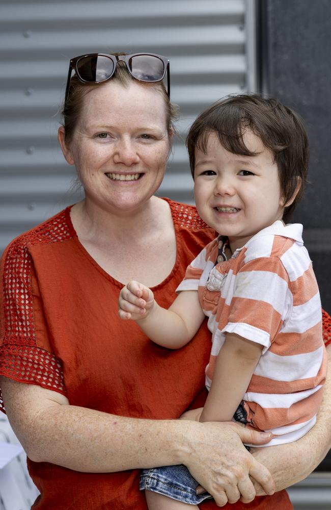 Amber Milne and Kobi Suy as families enjoy a day of fun and activities at a special Harmony Day celebration at the Malak Community Centre as part of the Fun Bus program. Picture: Pema Tamang Pakhrin