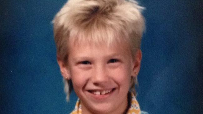 January Jones at age 9. Killer hair.