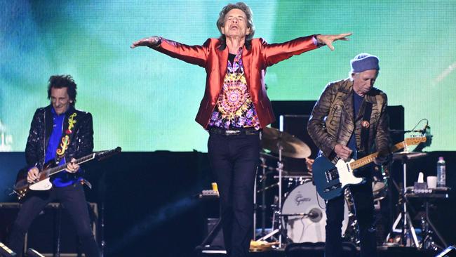 Rolling Stones members Ronnie Wood, left, Mick Jagger and Keith Richards play in Madrid last year. They like to point out they are still filling stadiums five decades after The Beatles broke up. Picture: AFP