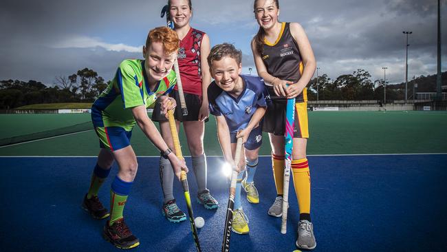 Junior hockey players (L-R) OHA's Jack Woodberry, DiamondBacks' Wilhelmina Fish, Angus McMullen from North-West Grads and University's Audrey Bullard. Picture: LUKE BOWDEN