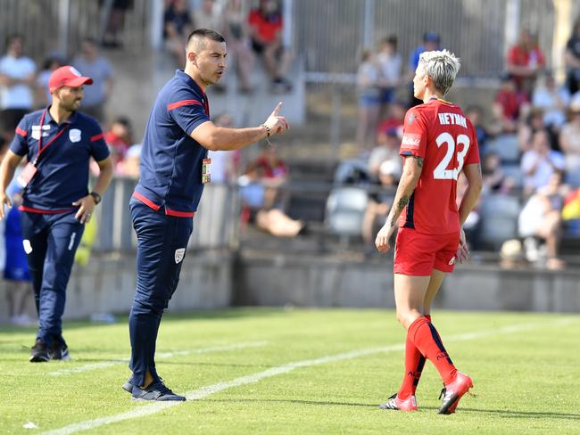 Adelaide United coach Ivan Karlovic speaks to striker Michelle Heyman during the Reds’ clash with Western Sydney Wanderers. Picture: AAP Image/Kelly Barnes