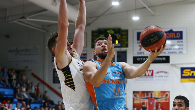 Marlins' Joel Matysek finds the basket in the Queensland Basketball League (QBL). PICTURE: BRENDAN RADKE