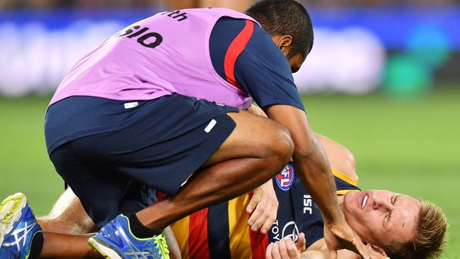 DOWN BUT NOT YET OUT: Crow David Mackay was concussed against Richmond but the club hopes he will play against St Kilda on Saturday night. Picture: David Mariuz (AAP).