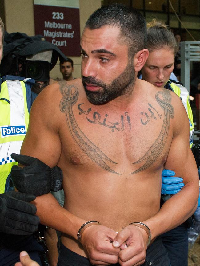 One of the men led from Melbourne Magistrate's Court by police after the brawl.