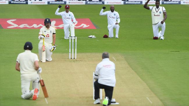 England and West Indies cricketers take the knee before a Test last year. Picture: Getty Images