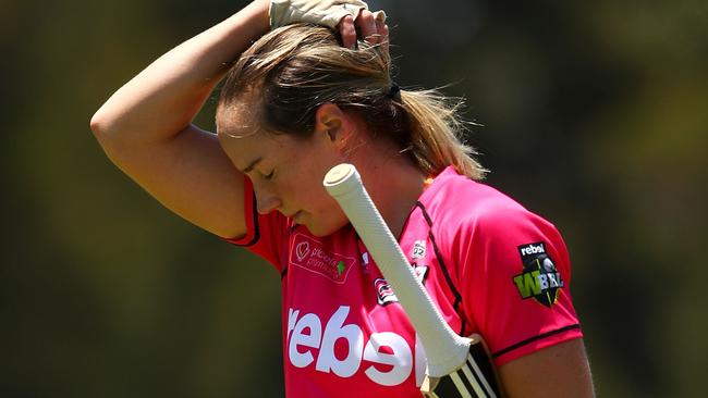 Sydney Sixers captain Ellyse Perry looks dejected after being dismissed. Pic: Getty Images)