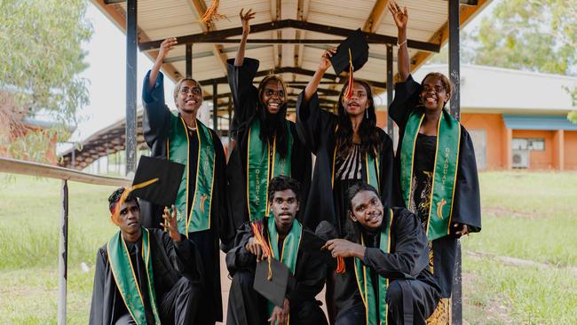 Back row: Brody Karui, left, Mary Papuli, Jazz Dumoo and Concepta Karui. Front row: Benjamin Mullumbuk, left, Jonah Nemarluk and Ezekiel Narndu. Picture: Courtney Davies