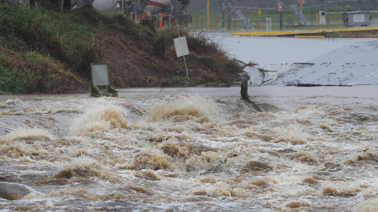 Floodwaters at Oxenford on the Gold Coast. Picture: Scott Powick