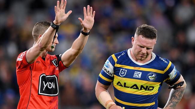 Nathan Brown of the Eels is sent to the sin bin by referee Grant Atkins.