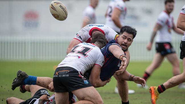 Collegians replacement Jaycob Oloaga flicks a pass out the back. Pics by Julian Andrews.