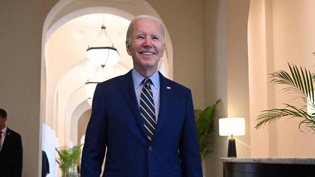 Joe Biden smiles as he speaks about the US midterm election results while attending the East Asia Summit. Picture: AFP.