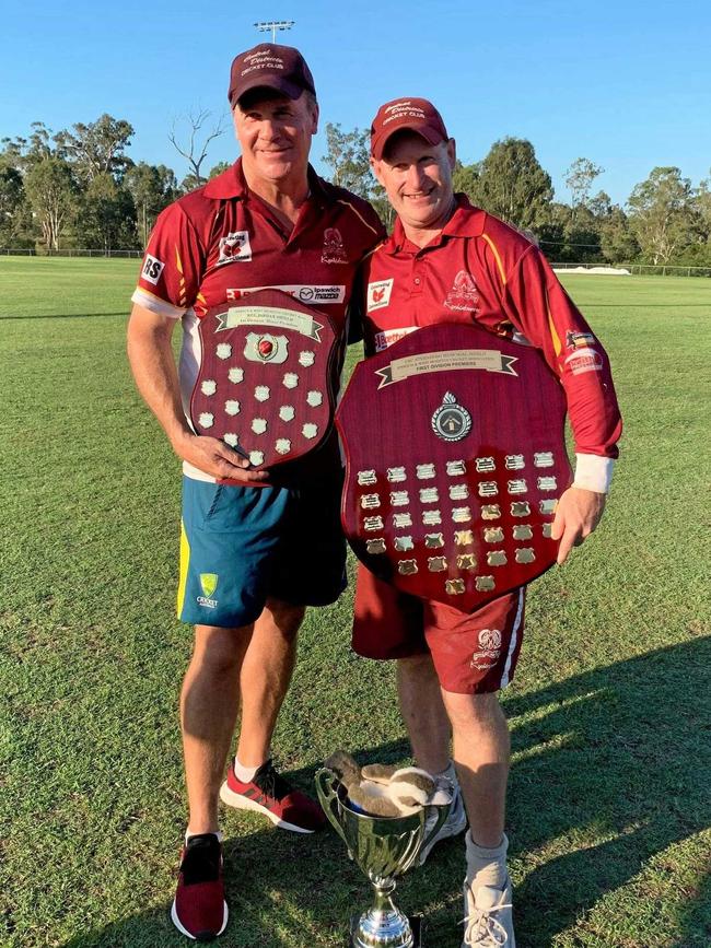 Centrals coach Scott Barrett with captain Wayne Jones after winning the first division premiership in 2018/19.