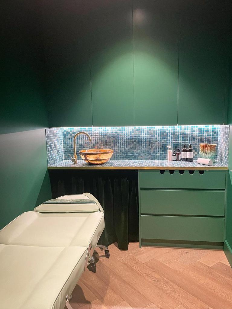 Appel’s clinics stand out with their unique forest green design. Supplied/TheSkinBar