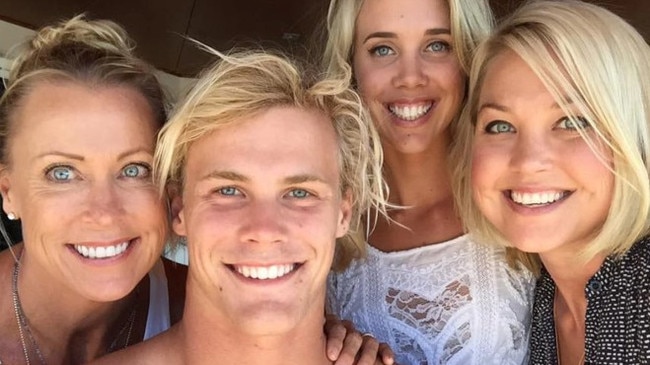 Jett Kenny (centre) with mum Lisa Curry (left) and sisters Morgan and Jaimi (far right).