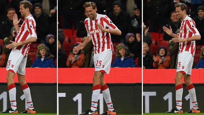 Stoke City's Peter Crouch does his "robot" celebration after scoring his 100th EPL goal.