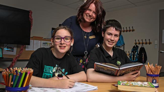 Ohana College principal Tenneille Lynham with Year 8 students Emma Fox, 14, and Frankie Lapuh, 14. Picture: Zak Simmonds