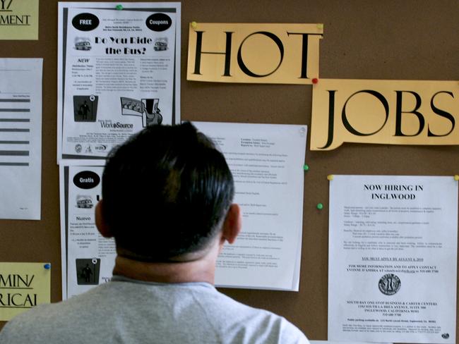 Generic image of a job seeker looking at postings for jobs at the Verdugo Jobs Center, which includes a California Employment Development satellite office, in Glendale, California, U.S., on Friday, Aug. 6, 2010. U.S. companies hired fewer workers than forecast in July, evidence of what Federal Reserve Chairman Ben S. Bernanke has called an &uncertain& economic environment that may keep him focused on reviving growth. Overall employment fell by 131,000 and the jobless rate held at 9.5 percent. Photographer: Jonathan Alcorn/Bloomberg