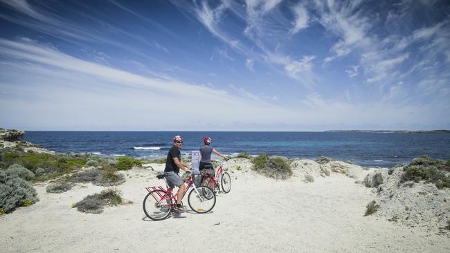 Hire a bike and pedal your way around Rottnest Island. Picture: Tony McDonough/AAP