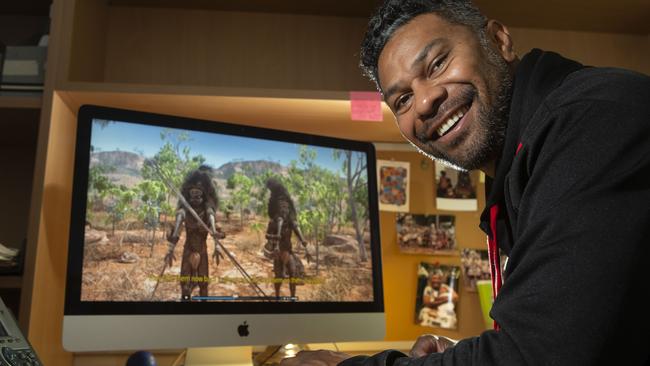 Wunungu Awara project manager Fred Leone shows some of the 3D animations being used to help preserve indigenous languages. Picture: Valeriu Campan