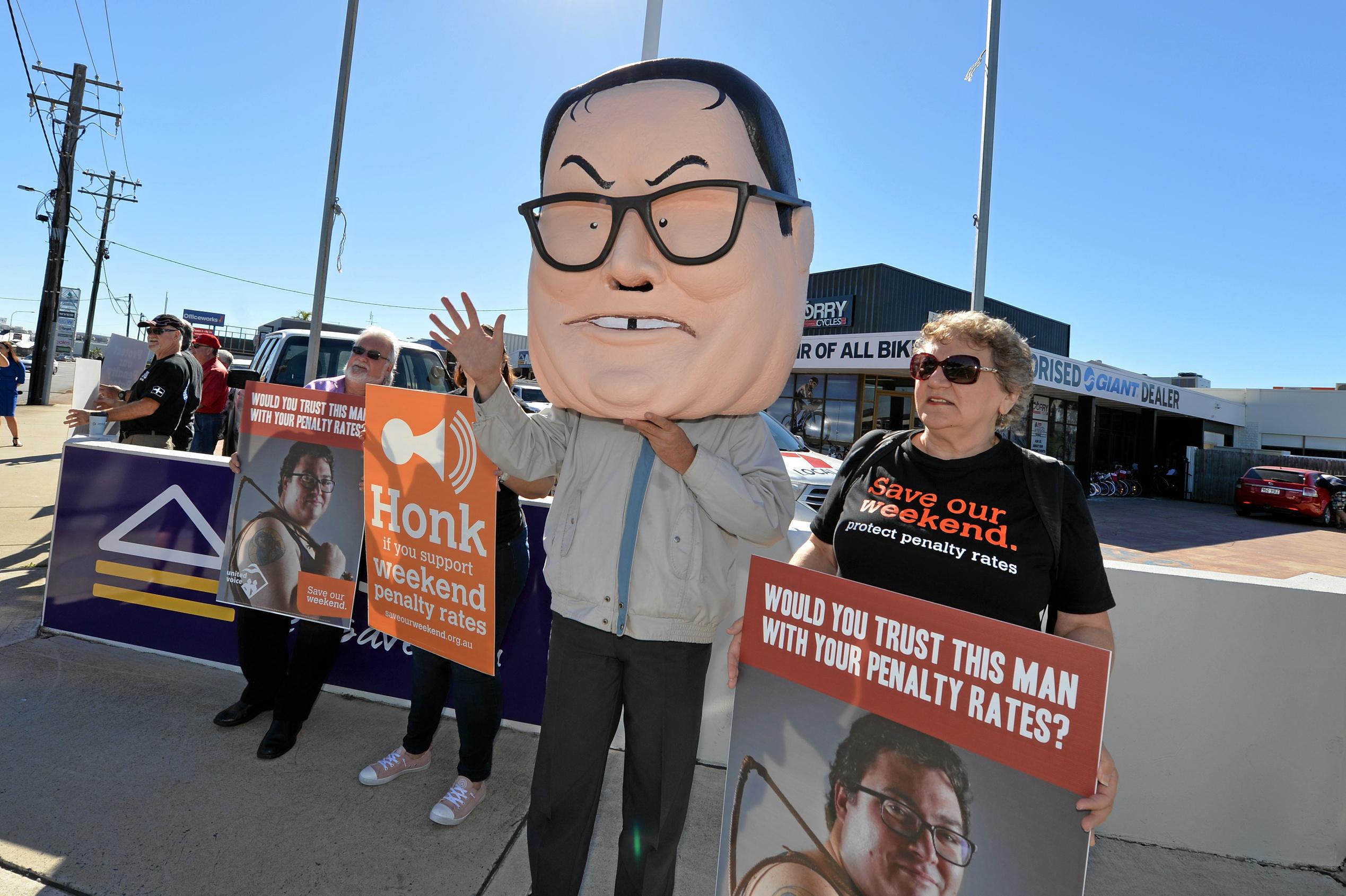 United Voice protesting for penalty rates at MP for Dawson George Christensen office in Mackay. Picture: Stuart Quinn