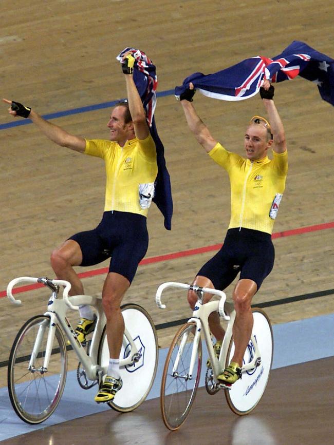 Cyclists Scott McGrory and Brett Aitken celebrate winning gold. (Picture: Sarah Reed)