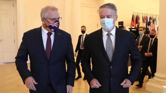 OECD secretary-general Mathias Cormann hosts Scott Morrison at the organisation’s Paris headquarters in June. Picture: Adam Taylor/PMO