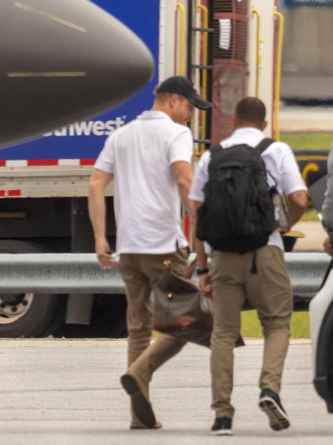 Harry disembarked the flight in Atlanta. Picture: Backgrid Australia