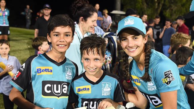 Brisbane Heat player Charli Knott of the Heat pose with fans at the end of the Women's Big Bash League match between the Adelaide Strikers and Brisbane Heat at Harrup Park on November 02, 2019 in Mackay, Australia. Picture: Ian Hitchcock/Getty Images