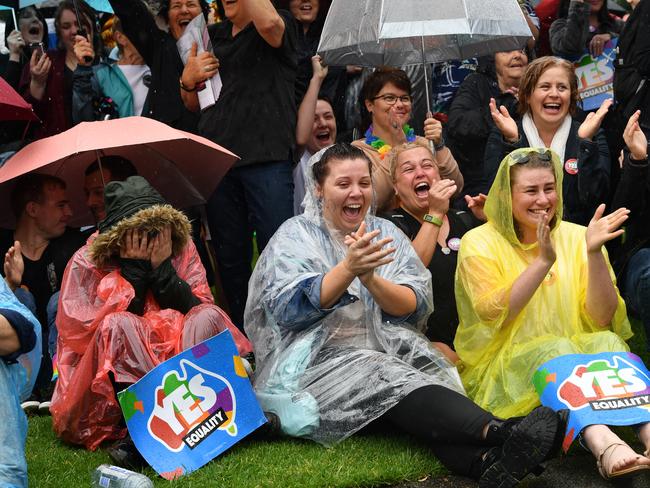 People react at the marriage equality rally in Hindmarsh Square, Adelaide, Wednesday, November 15, 2017. Australians have given same-sex marriage their approval with a 61.6 per cent ‘yes’ vote in a voluntary survey. Picture: AAP Image/David Mariuz