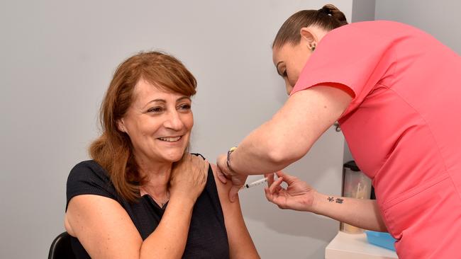 2021: Mayor Jenny Hill gets her COVID-19 jab from Registered Nurse Natalie Hardy at the Upper Ross Medical Centre. Picture: Evan Morgan