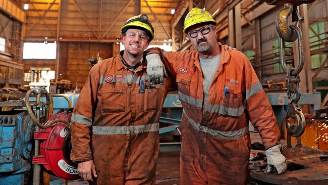 Fitter and turners Ken Roesler and Paul Monaghan at the Caster Maintenance Services area of the Heavy Machine Shop at the Whyalla steelworks in 2017. Picture: Dylan Coker