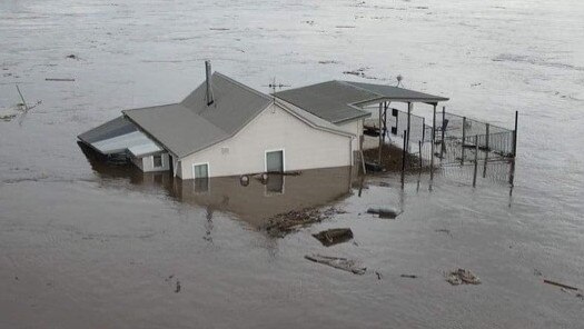 A house floating down the Manning River at Mondrook. Picture: Facebook