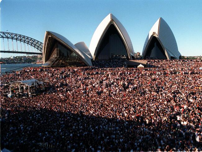 More than 100,000 people crowded the Opera House and surrounding foreshores to hear the band perform their last show. Picture: News Corp Australia