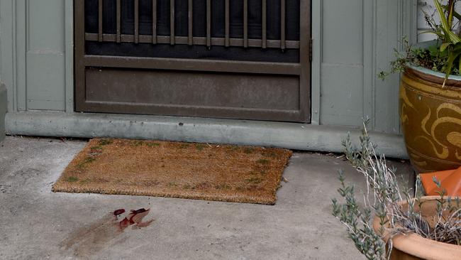 A blood stain remained outside the property’s front door. Picture: NCA NewsWire / Andrew Henshaw