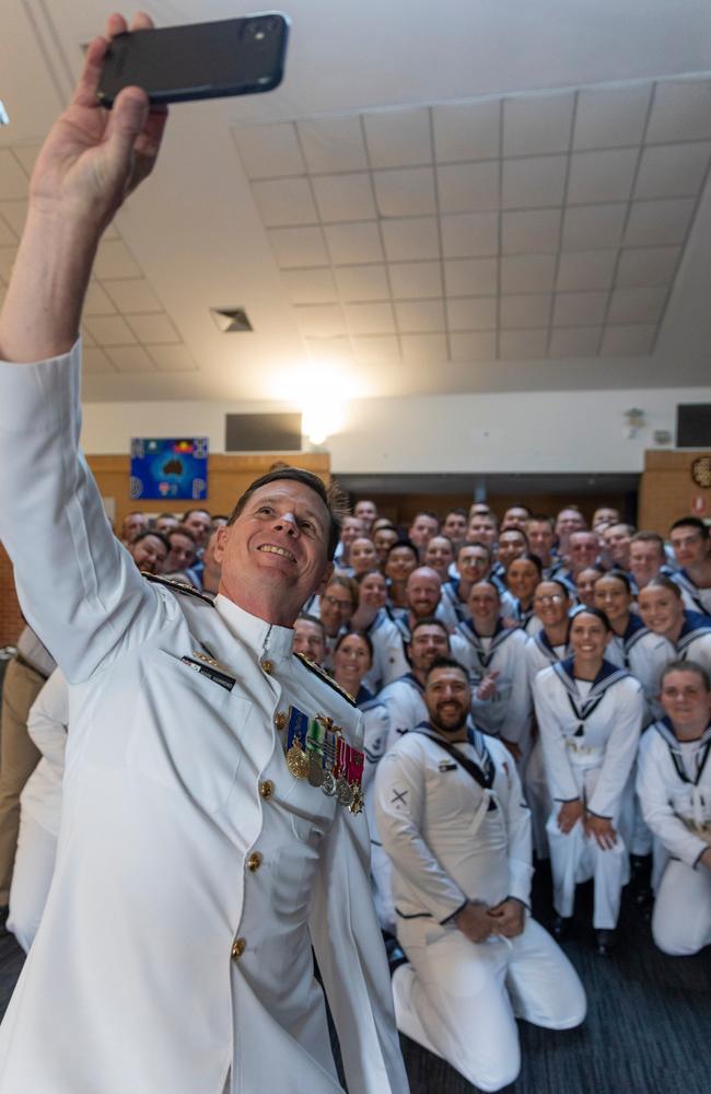 Chief of Navy Vice Admiral Mark Hammond takes a selfie with General Entry 408 Taylor Division graduating recruits at the Royal Australian Navy Recruit School at HMAS Cerberus, Victoria.