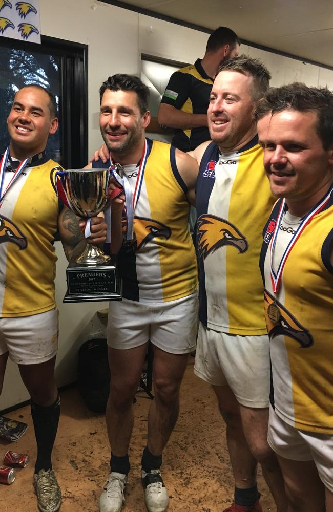 Russell Robertson celebrates Doveton Eagles’ premiership.