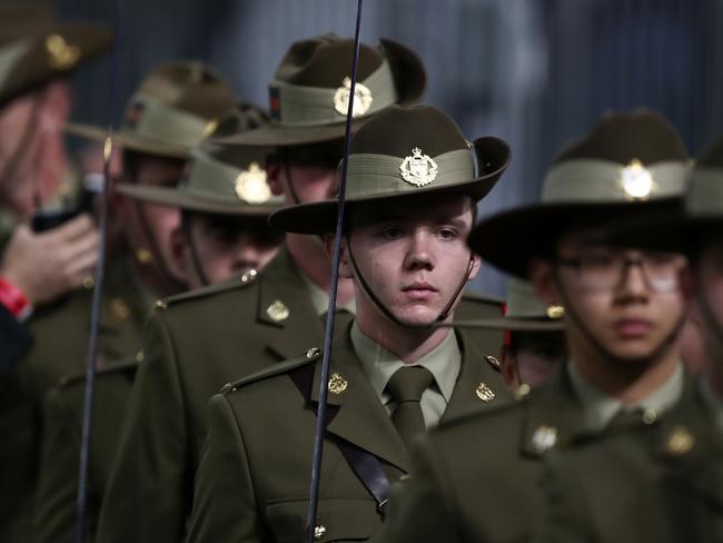 Participants during the Anzac Day ceremony before the Round 6 AFL match between the Fremantle Dockers and the Western Bulldogs  at Optus Stadium in Perth, Saturday, April 27, 2019.  (AAP Image/Gary Day) NO ARCHIVING, EDITORIAL USE ONLY