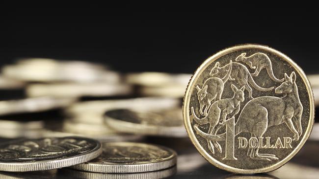 Australian dollar coins on a dark reflective background. Picture: iStock