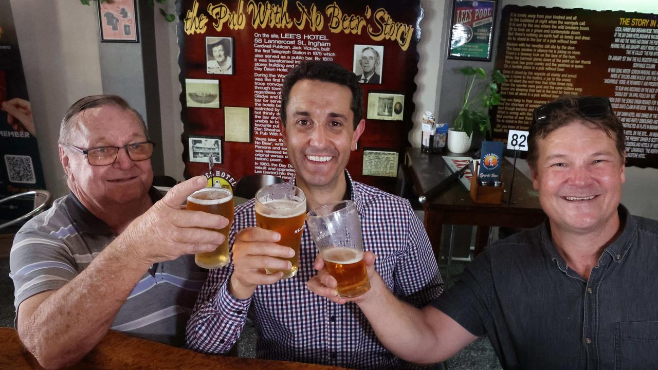 David Crisafulli buys a round for the patrons of The Pub With No Beer including Phillip Strid and his son Clinton Strid, Ingham. Picture: Liam Kidston.