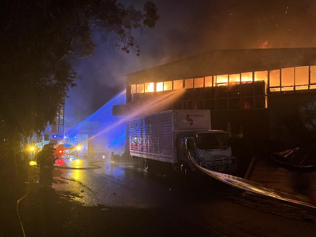 Firefighters have set up a defensive perimeter around the fire. There are no reports of injuries at this stage. Picture: Fire and Rescue NSW