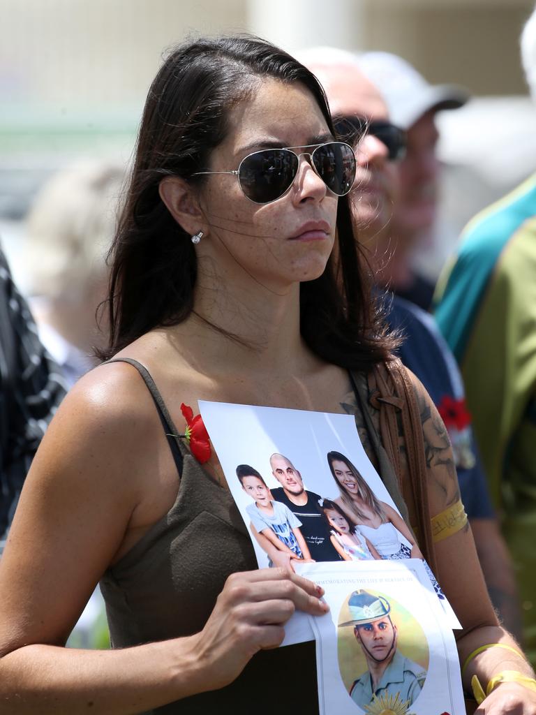 War widow, Ashleigh Boileau whose former partner, soldier Bradley Carr committed suicide at the Remembrance Day commemorations at the Cairns Cenotaph calling for a Royal Commission in to suicides of Military personnel . PICTURE: ANNA ROGERS